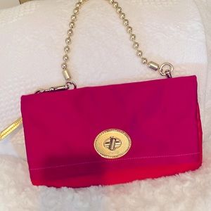 Beautiful authentic Coach envelope satin purse.